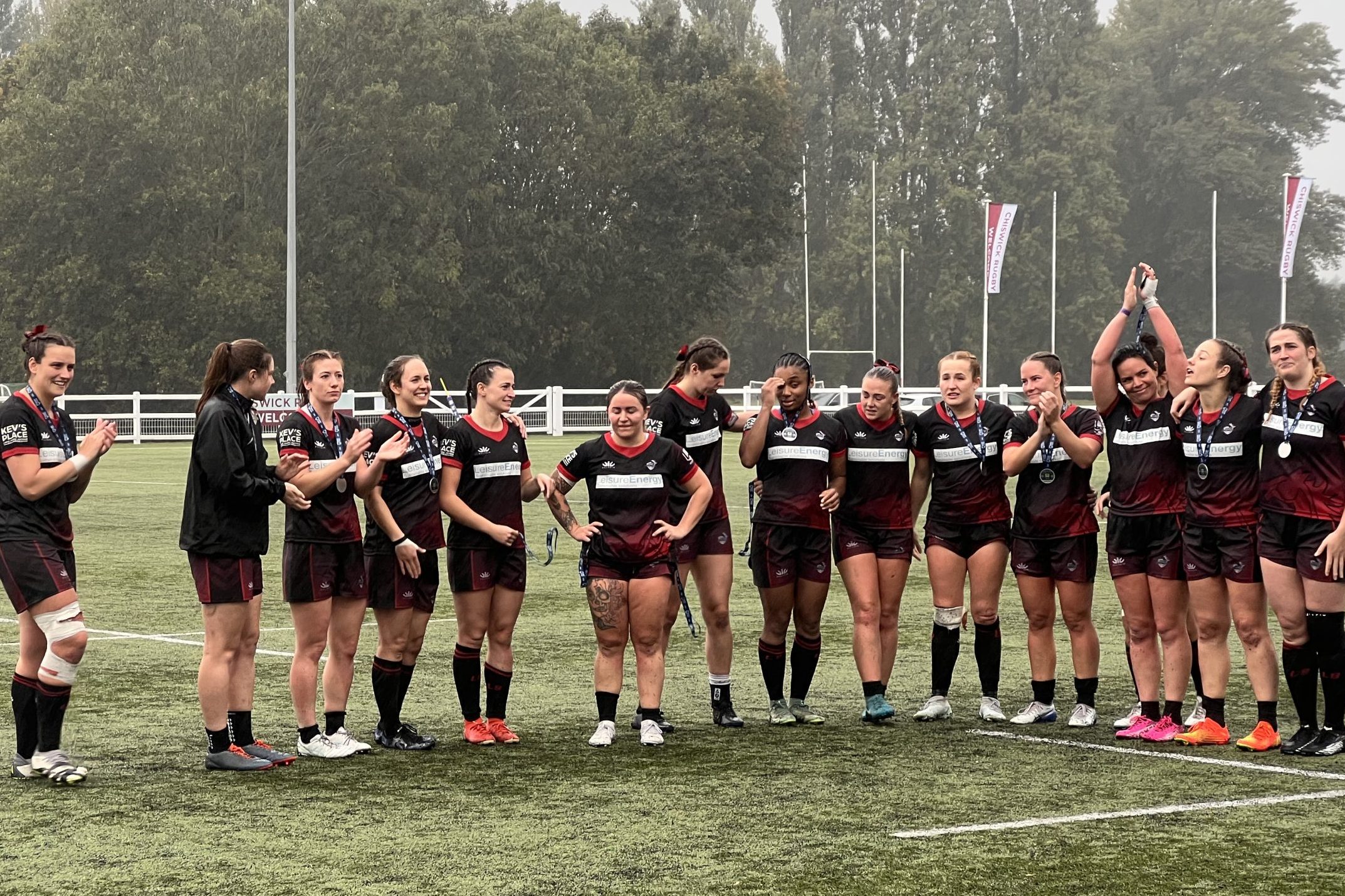 This is a photo of the London Broncos Women's team, after collecting their silver medals