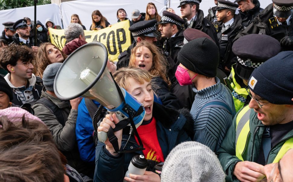 Fossil Free London climate action group protesting in London.