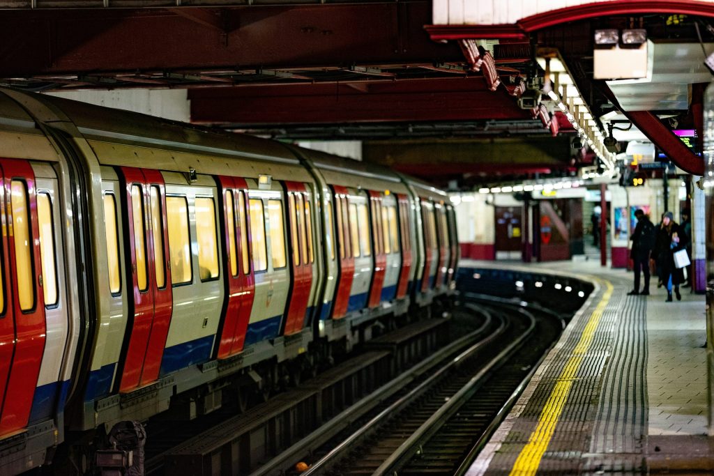 London underground Train on the tracks stopped at a platform