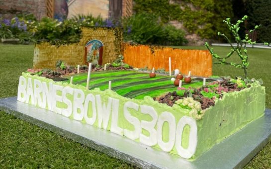 This is a picture of a birthday cake on the green of Barnes Bowling Club, which turned 300 years old this year.