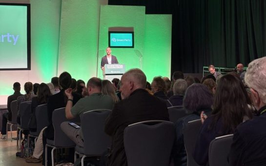Green Party leader Zack Polanski giving a party conference speech