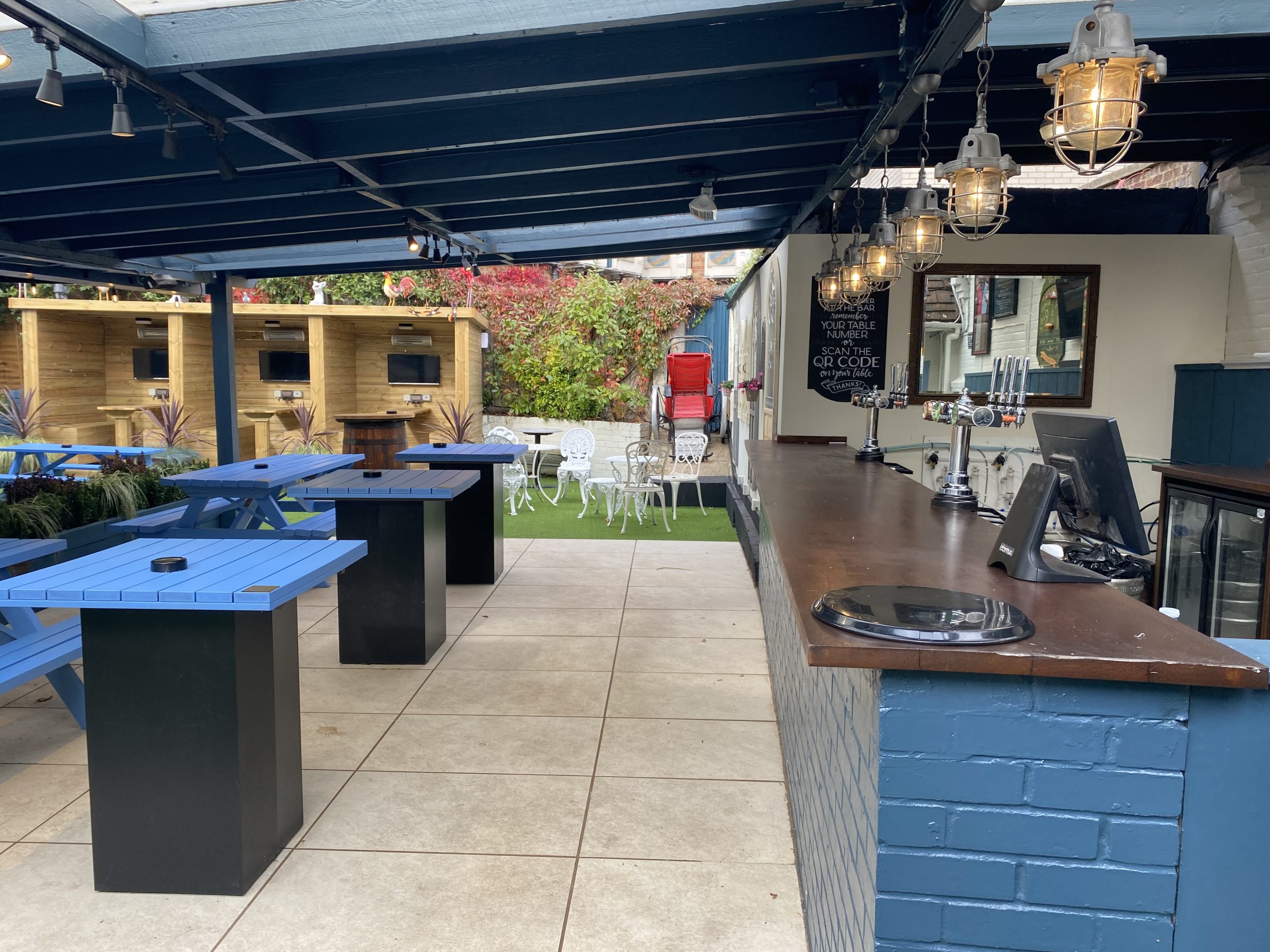 The beer garden, equipped with a large seating area