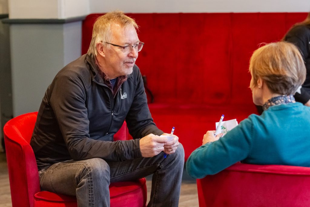 Two class attendees deep in discussion, we're unsure if they're acting, or discussing their roles- but it looks intense!