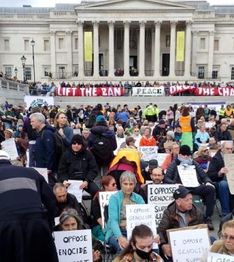 Peaceful protestors sitting in Trafalgar Square to demonstrate against the proscription of Palestine Action.