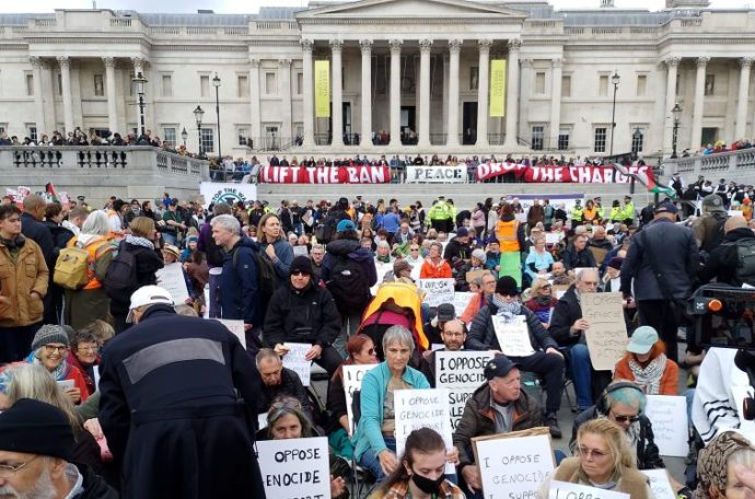Peaceful protestors sitting in Trafalgar Square to demonstrate against the proscription of Palestine Action.