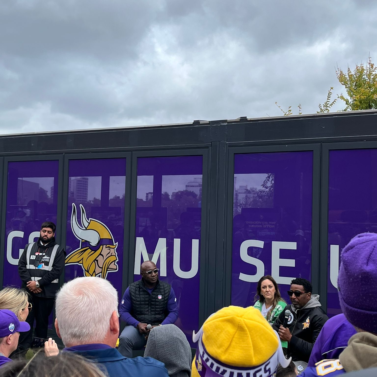 Cris Carter and John Randle answering questions during a Q&A 