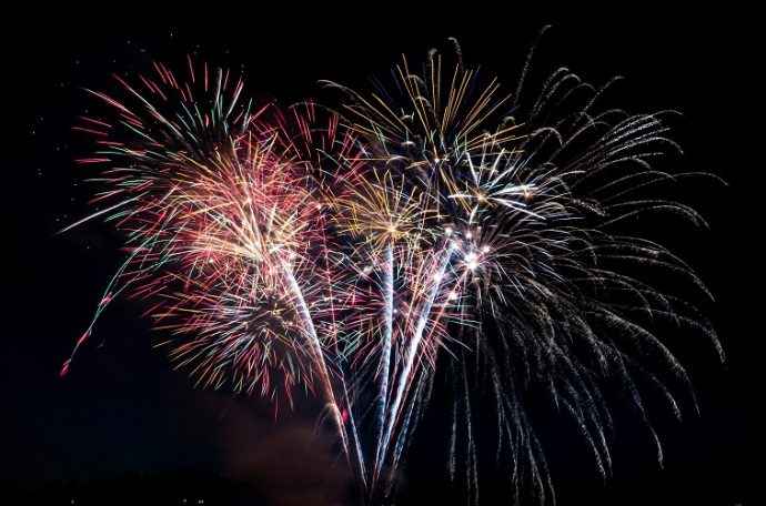multi-coloured fireworks lighting up the night sky