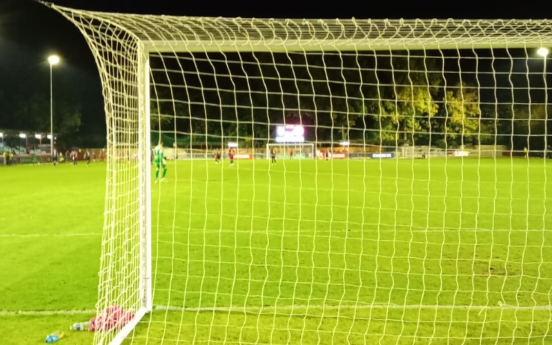 This is a picture taken behind the Hampton & Richmond goal, under the floodlights.