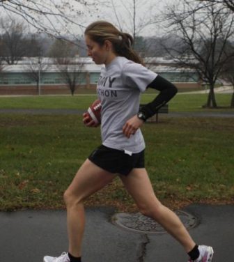 Woman having an early morning run in the park.