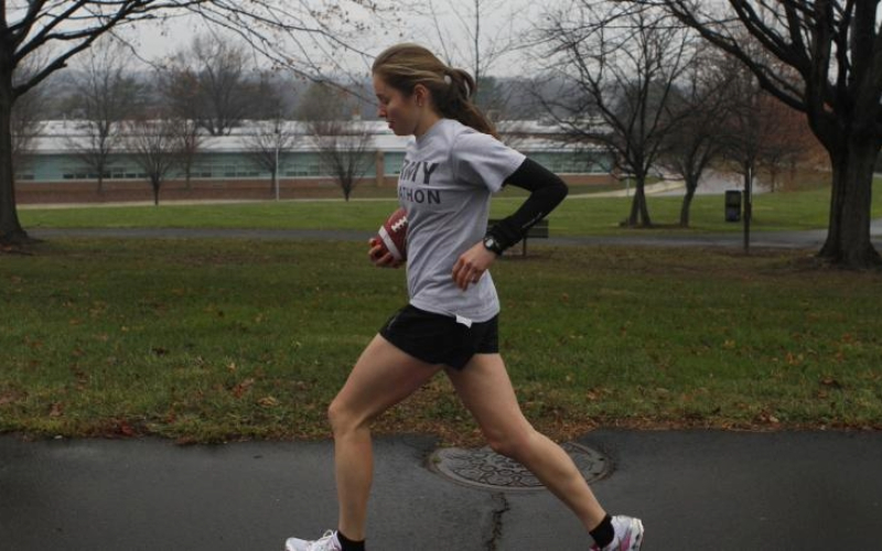 Woman having an early morning run in the park.