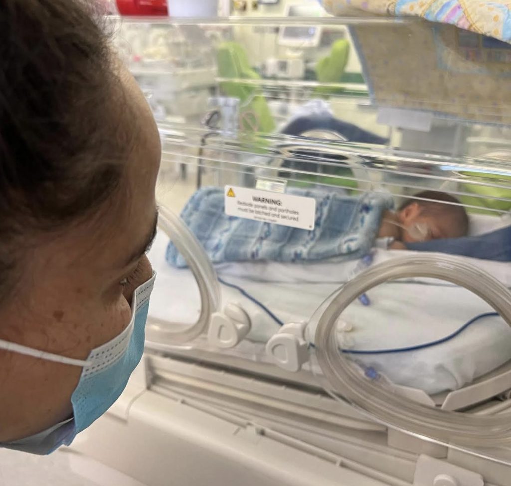 Mother, Elleasha, visits her newborn baby