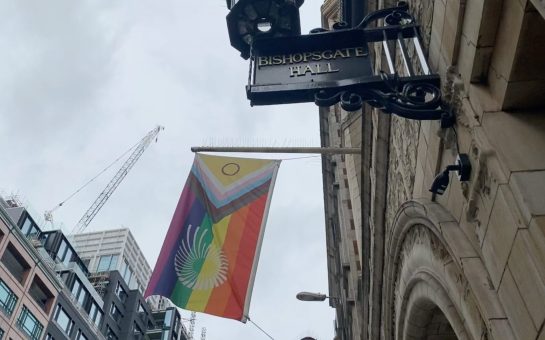 Pride flag hanging from Bishopsgate Institute in London