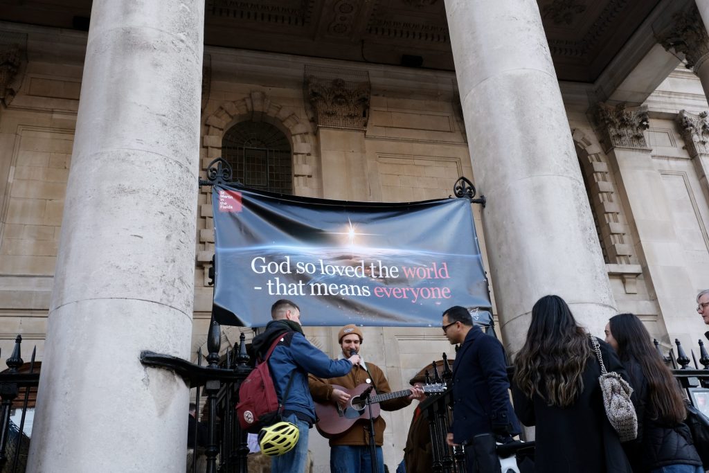 Attendees at St-Martin-in-the-Fields celebrated welcoming messages of the Nativity story on the church steps. Credit: Hamish McCorriston