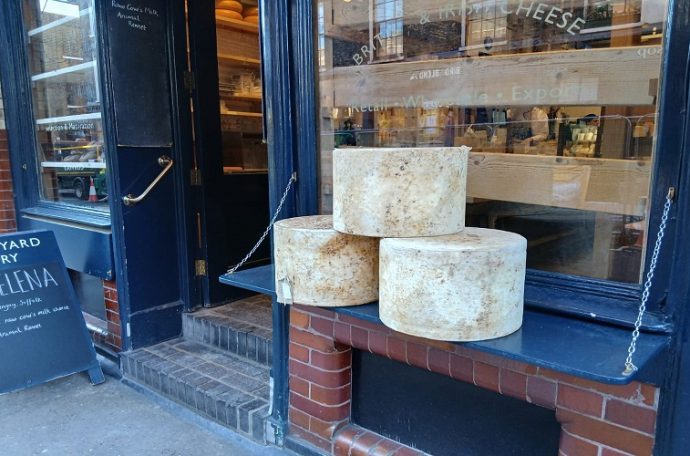 Some hard cheeses stacked outside a cheese shop. Credit: Jonny Singh