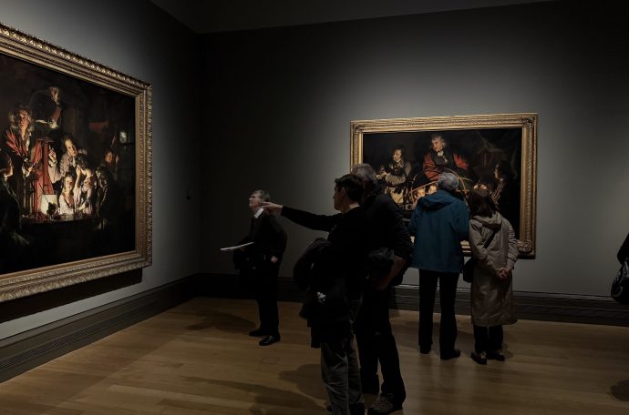 Orrery and The Air Pump pictured next to each other in gallery space