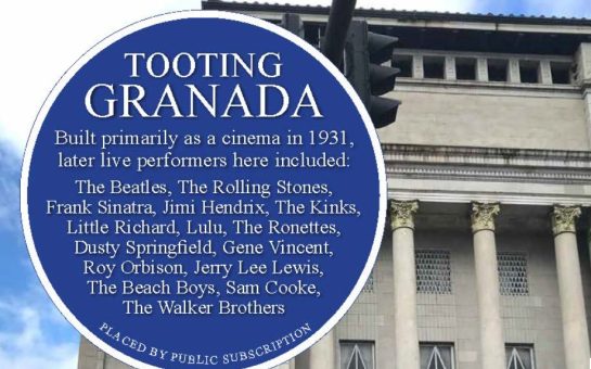 Close up of the Tooting Granada Blue Plaque in front of the Tooting Granada