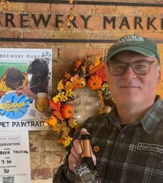 Ale Hunters founder Paul Davies poses with one of his favourite craft beers.