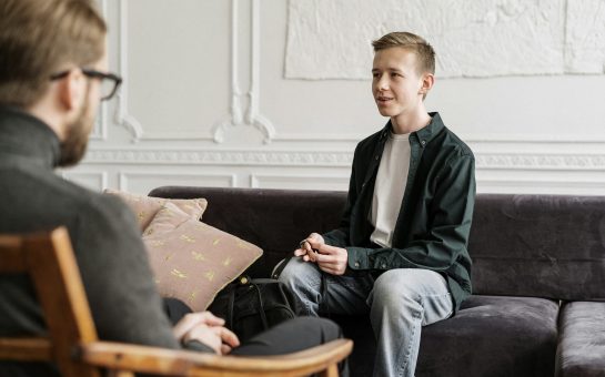 Young adult talking to therapist
