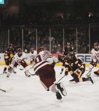 Ice hockey players in a game on the ice rink