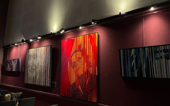 Three of McGinley's oil painting artworks at the Irish Cultural Centre.