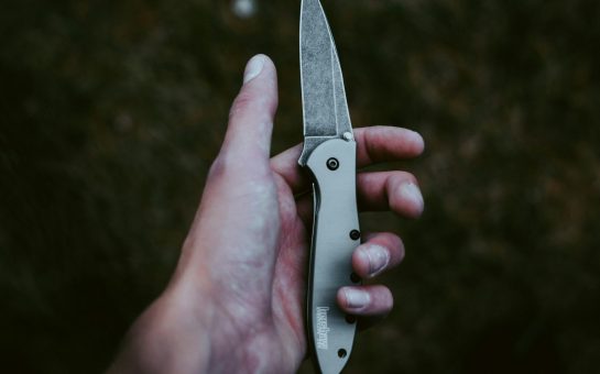 hand holding a knife