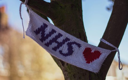 Knitted NHS flag with heart