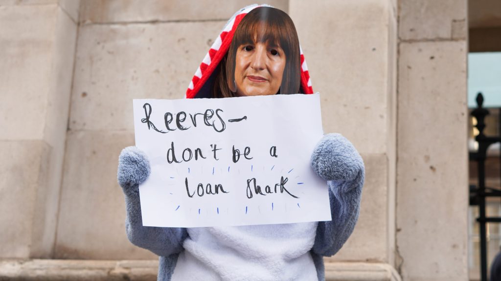 Outside the Houses of Parliament, protesters dressed as sharks and wearing masks of Reeves chanted: “Stop the freeze, stop the freeze, can’t afford to pay anymore,” criticising the threshold freeze and the wider student loan system.