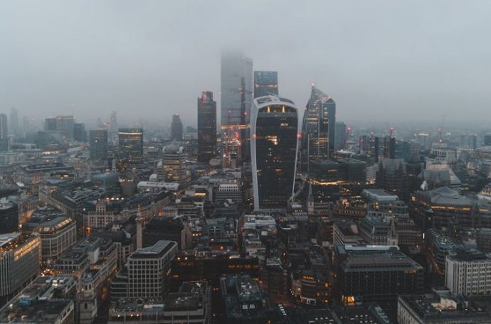 Aerial shot of central London engulfed in fog.