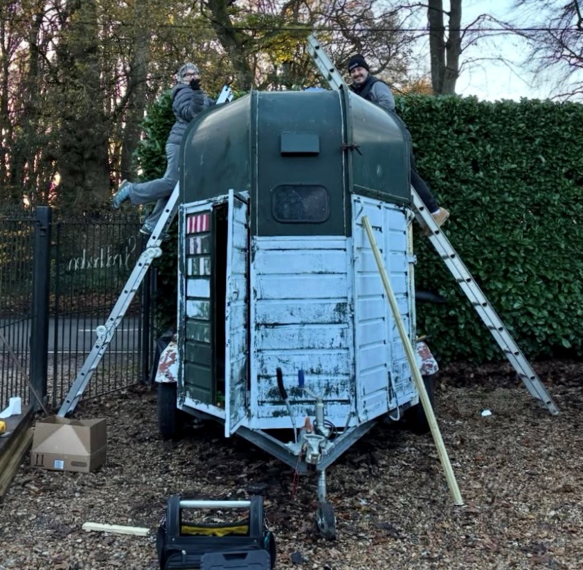 TEAM EFFORT: Lily working on the horse-box with her step dad Stewart
Image credit: Sol n’ Shine