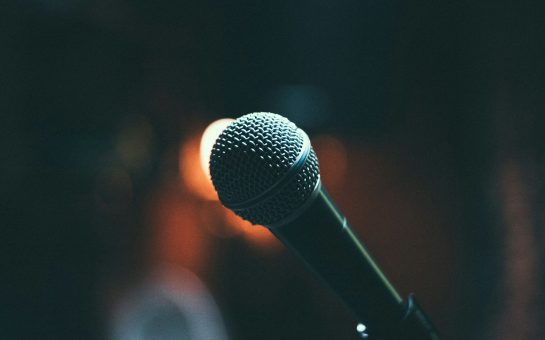Microphone at a stand-up comedy gig (Credit: Free to use from Unsplash)