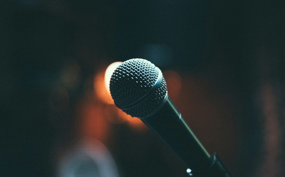 Microphone at a stand-up comedy gig (Credit: Free to use from Unsplash)