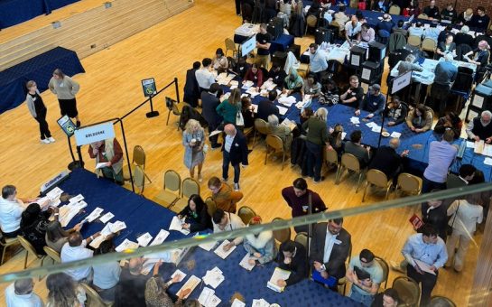 overhead view of election counters sorting ballot papers