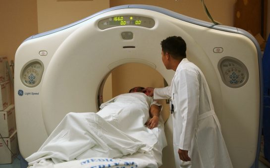 A patient being scanned by a doctor (Credit: Free to use from Pixabay)