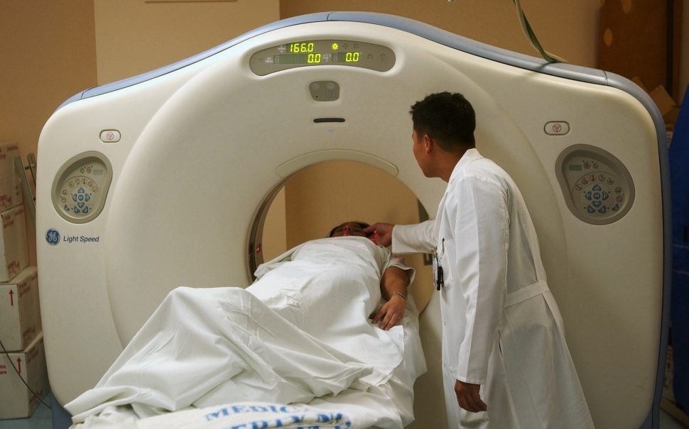 A patient being scanned by a doctor (Credit: Free to use from Pixabay)