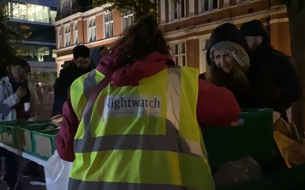 Nightwatch Volunteer distributing food