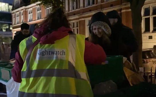 Nightwatch Volunteer distributing food