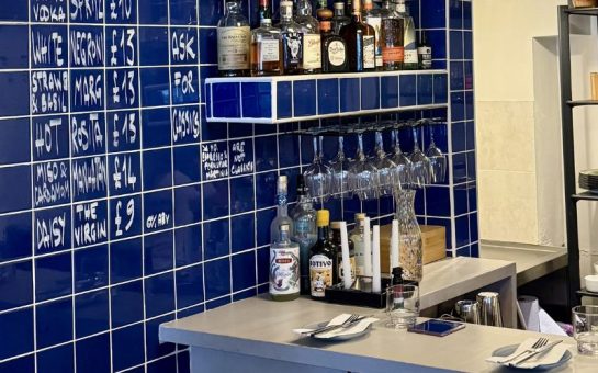 Counter tables and bottle shelves in restaurant