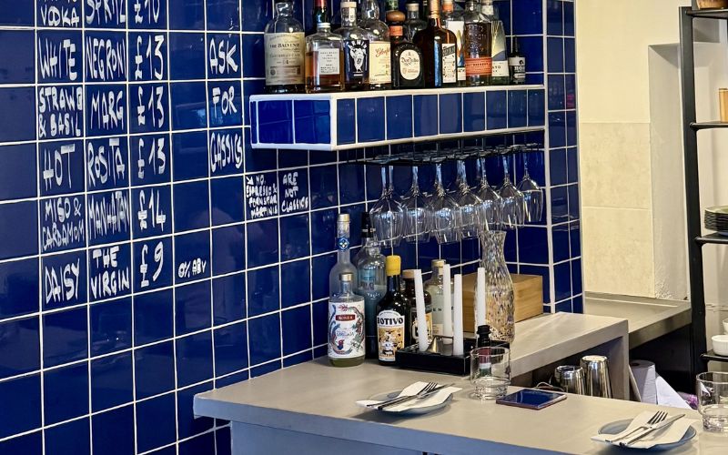 Counter tables and bottle shelves in restaurant