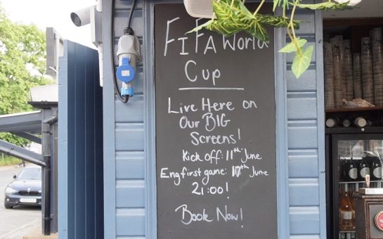 Black board with world cup schedule at pub