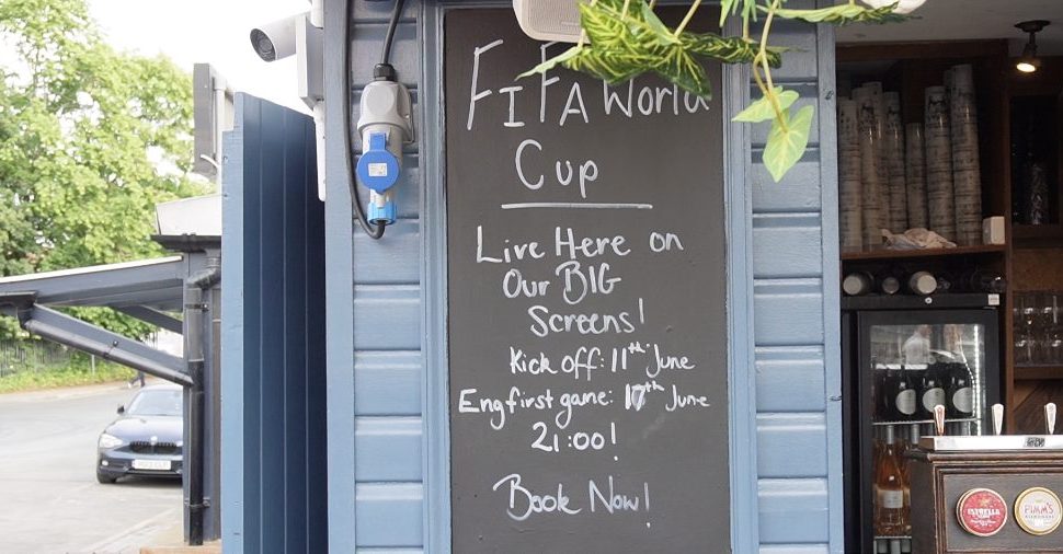 Black board with world cup schedule at pub