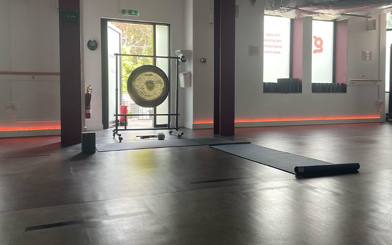 Yoga studio with gong.