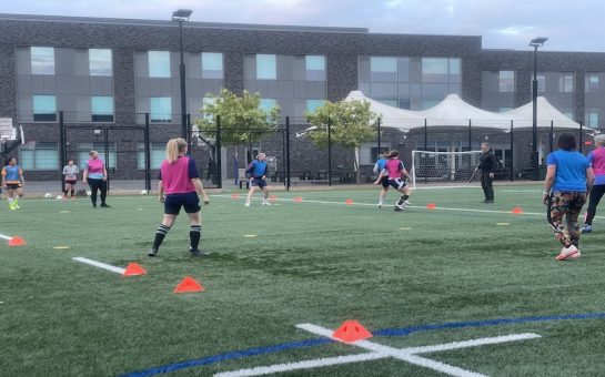 Women play football at the Twickenham Swans training ground