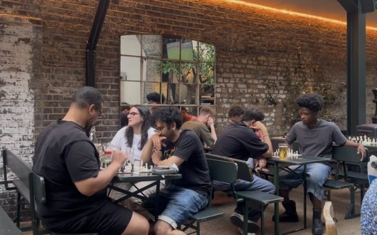 Attendees play Chess at The Hawk's Nest pub in Shepherd's Bush.