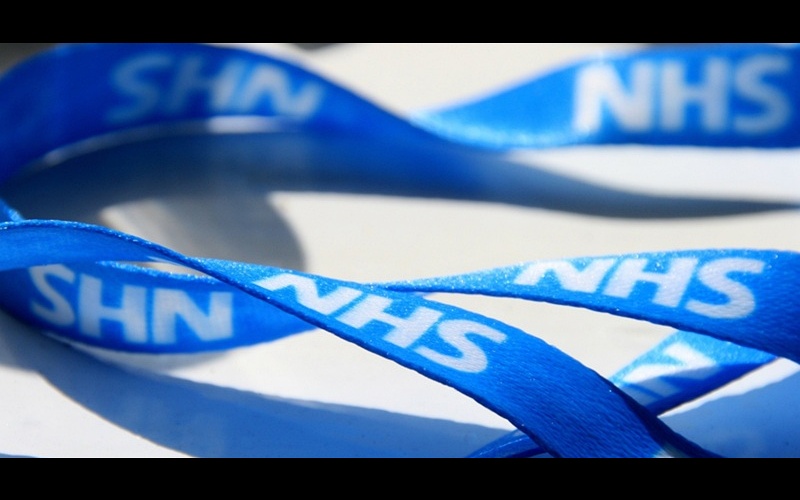 NHS lanyards blue public health funding London