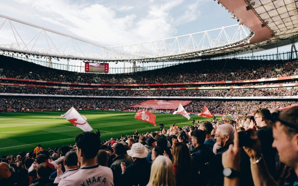 Photo from the crowd of Emirates Stadium, looking out to the pitch.
