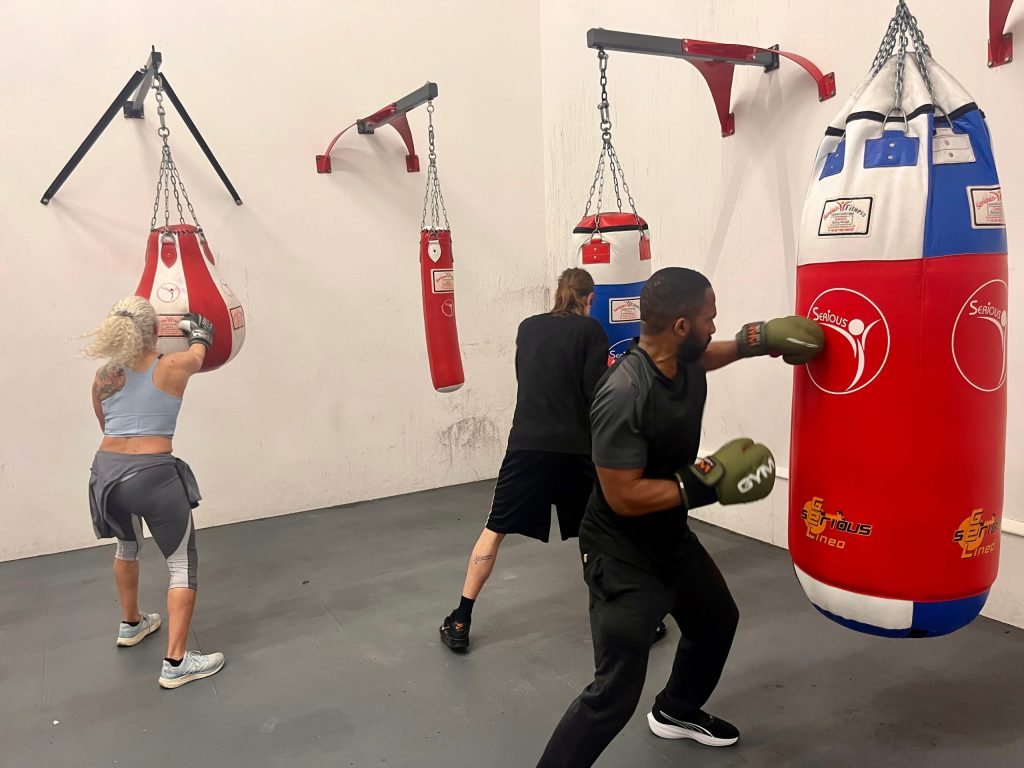 Members of the Afewee Boxing Club practice their combinations.