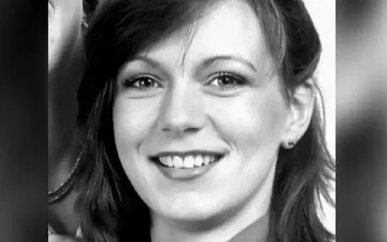 A black and white photo of a smiling Suzy Lamplugh.