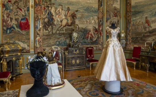 The room where Lady Rosemary's gown is being displayed, alongside the gloves and tiara worn.