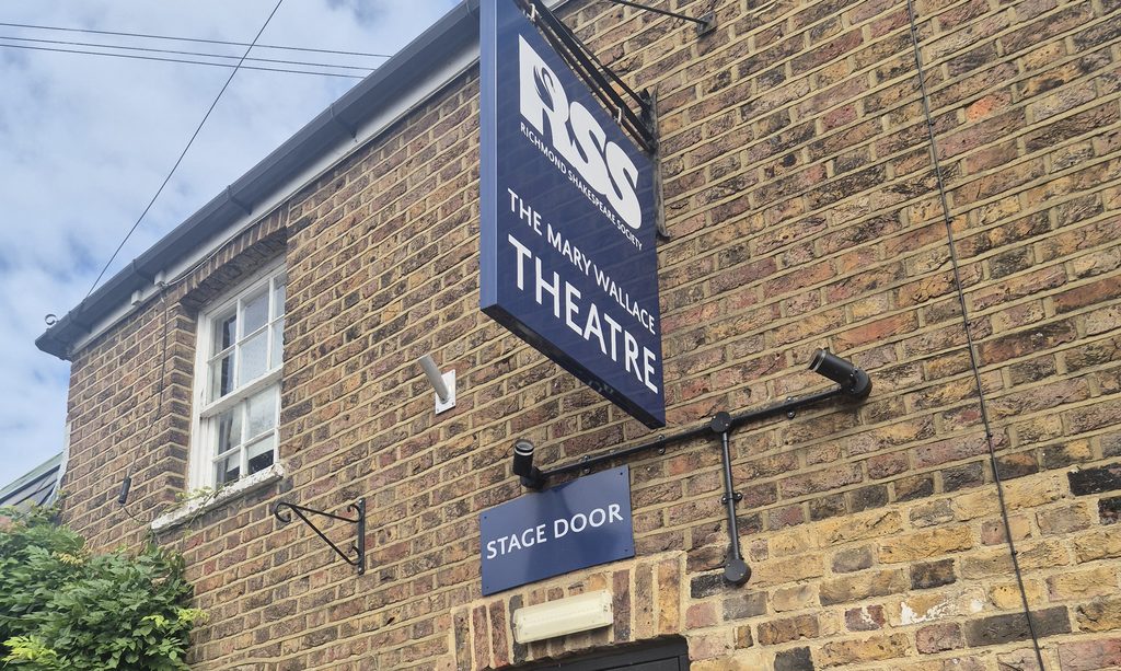 The stage door sign for the RSS