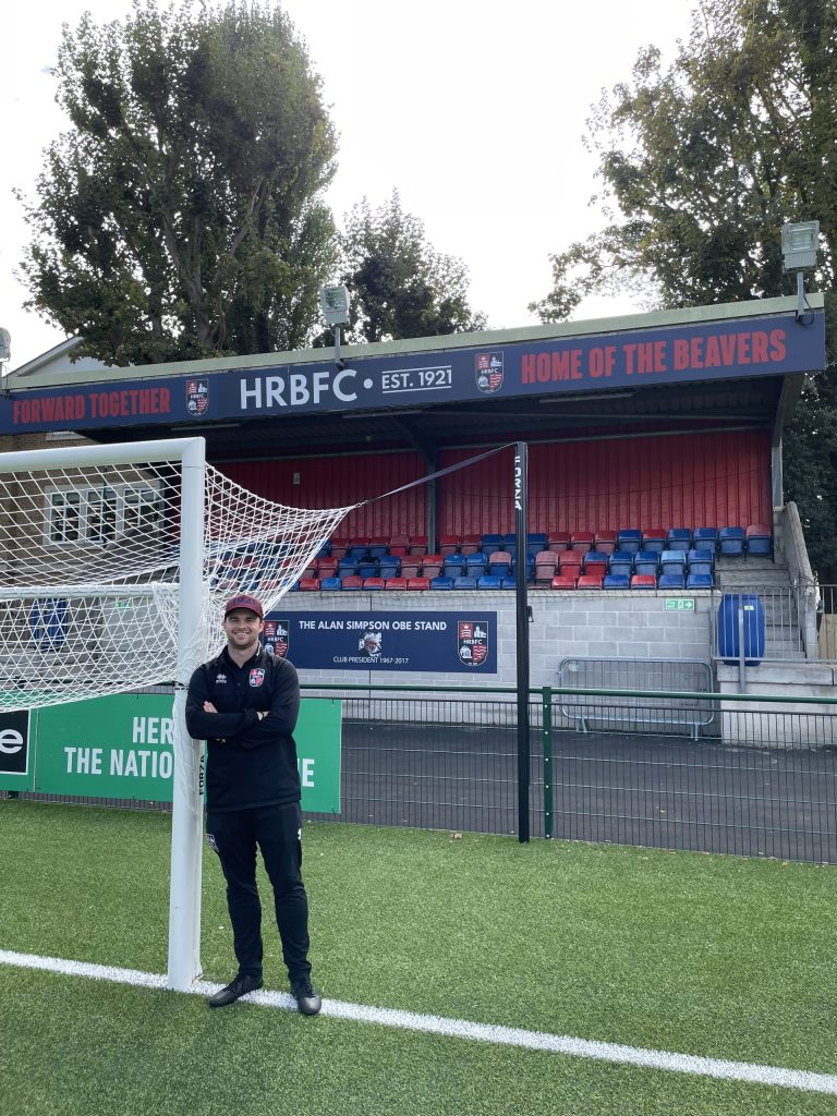 Jack Lonergan infront of fans stand